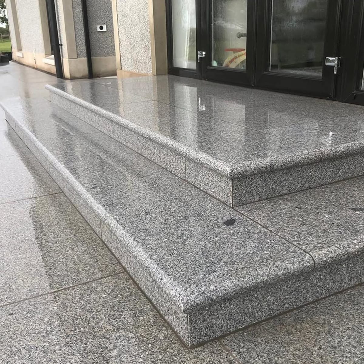 Classic Grey Granite used for entrance stairs and exterior steps of a residential house