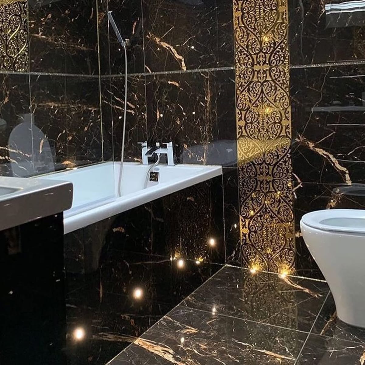 Golden Black Marble used in luxury bathroom walls and vanity design
