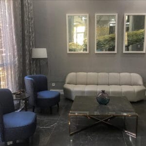 Luxury flooring featuring Pietra Gray Marble with a deep gray background and white veining, adding elegance to the interior.