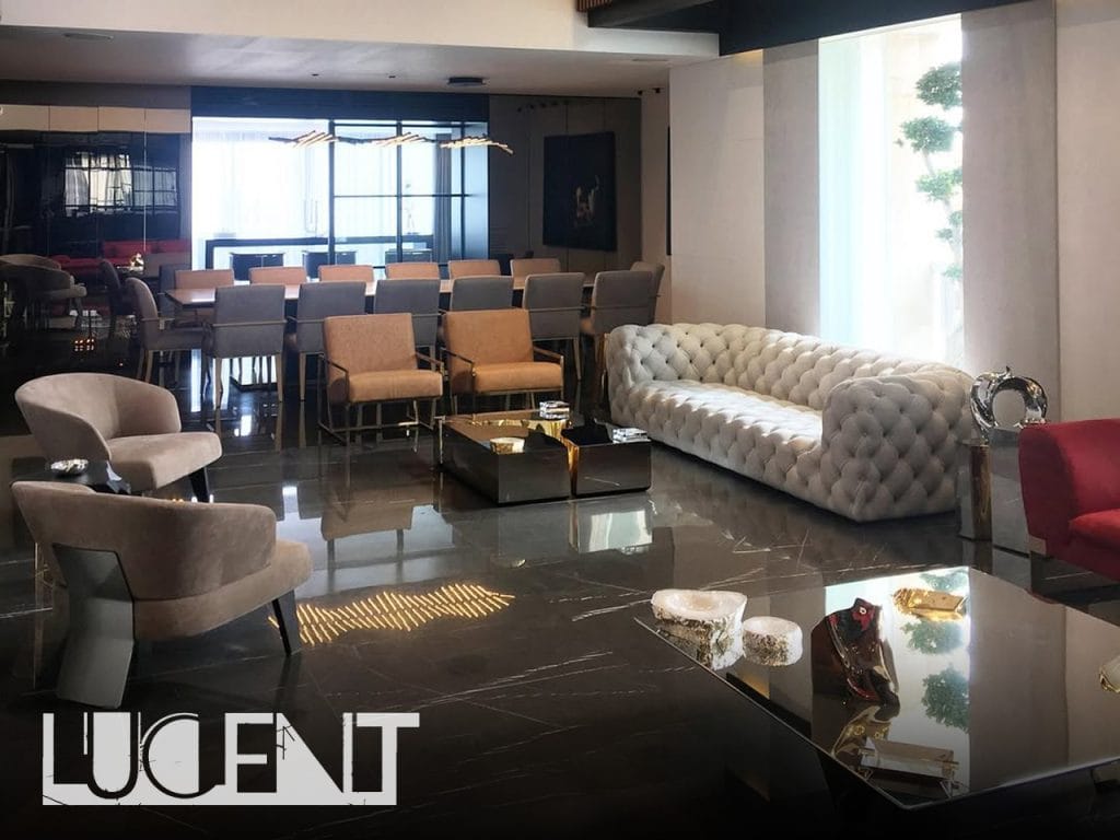 Luxury living room with Pietra Gray marble flooring, showcasing its elegant dark tones and white veining