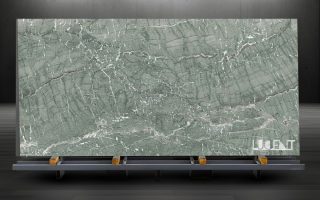 Verde Antigua Marble Slab on Rack – Export Ready Natural Stone Verde Antigua Marble slab displayed on metal holder ready for export or fabrication